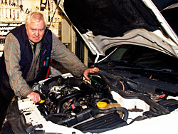 Automotive Engineering performing vehicle servicing